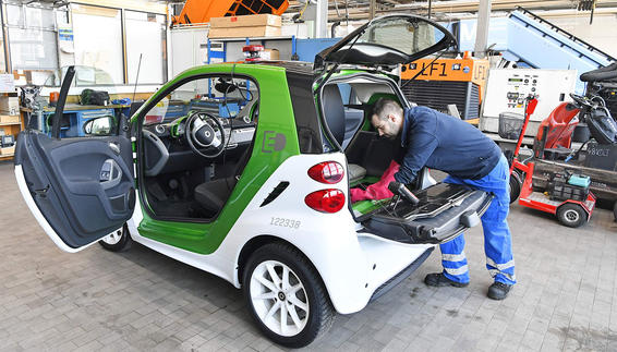 Mechanic engineer is working on an E-Car