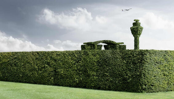 Silhouette of Munich Airport made out of a hedge